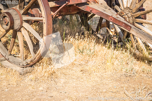 Image of Abstract of Vintage Antique Wood Wagons and Wheels.