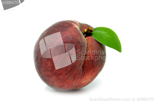 Image of Peach with leaf isolated on white