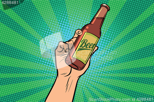 Image of beer bottle in hand