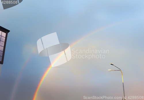 Image of Rainbow In The Blue Sky