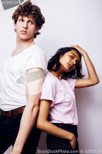 Image of young couple of mixed races girlfriend and boyfriend having fun on white background, lifestyle teenage people concept 