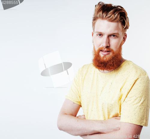 Image of young handsome hipster ginger bearded guy looking brutal isolated on white background, lifestyle people concept 