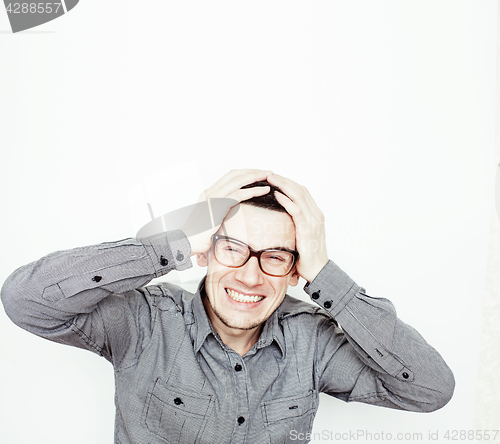 Image of young handsome teenage hipster guy posing emotional, happy smiling against white background isolated, lifestyle people concept 