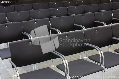 Image of Black chairs in a row