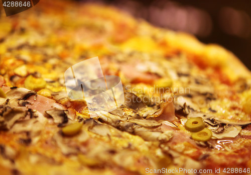 Image of tasty pizza with olives