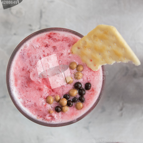 Image of Strawberry smoothie with cookie