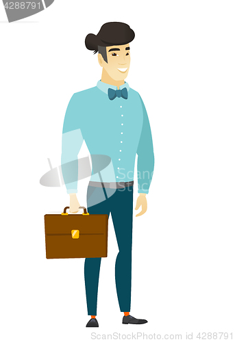 Image of Asian business man holding briefcase.