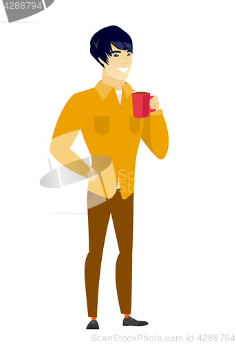 Image of Young asian businessman holding cup of coffee.