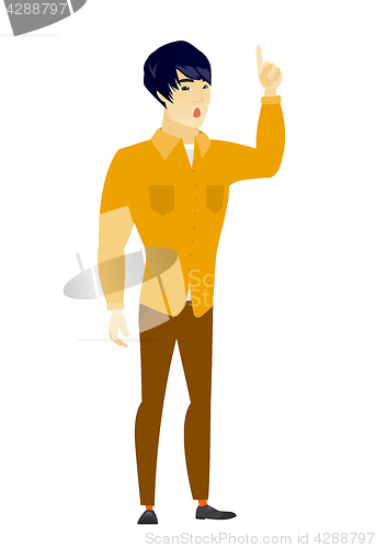 Image of Businessman with open mouth pointing finger up.