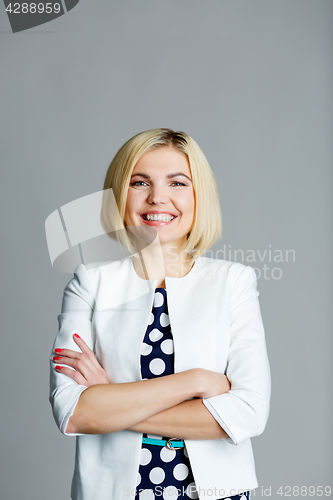 Image of Beautiful woman with arms crossed