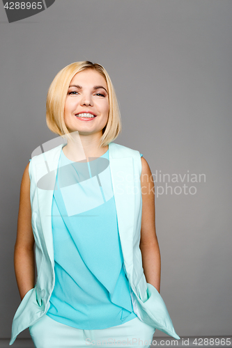 Image of Smiling girl on empty background