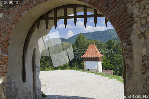 Image of Old gate in a stone fortress wall