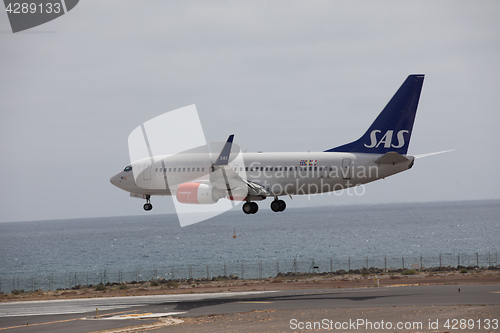 Image of ARECIFE, SPAIN - APRIL, 15 2017: Boeing 737-700 of SAS landing a