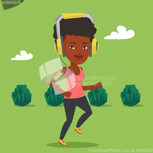 Image of Woman running with earphones and smartphone.