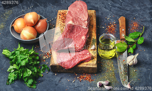 Image of Fresh beef on the kitchen board