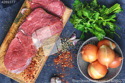 Image of Fresh beef on the kitchen board