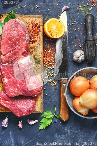 Image of Fresh beef on the kitchen board