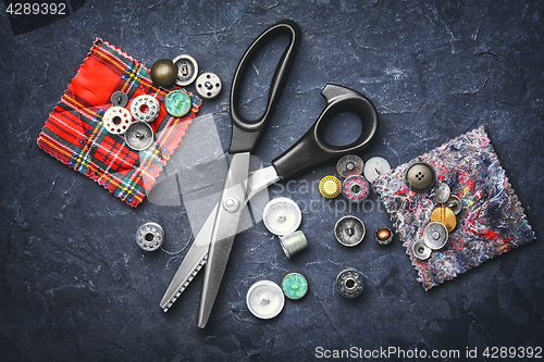 Image of scissors and buttons