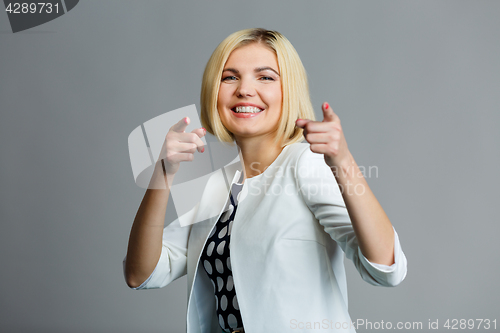 Image of Girl shows fingers in camera