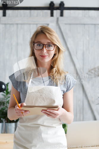 Image of Woman florist on background flower