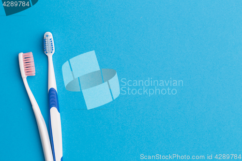 Image of Two toothbrushes, place for inscription