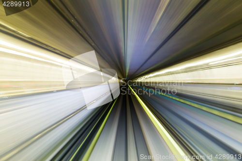 Image of Train moving fast in tunnel