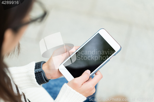 Image of Woman use of smart phone