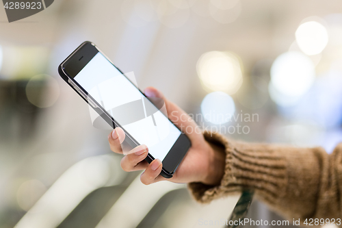 Image of Woman use of mobile phone