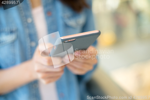 Image of Woman use of smart phone
