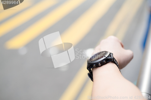 Image of Man wearing smart watch