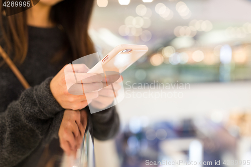 Image of Woman use of mobile phone