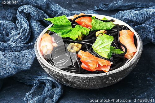 Image of black pasta with mussels and trout
