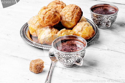 Image of Profiteroles and hot chocolate