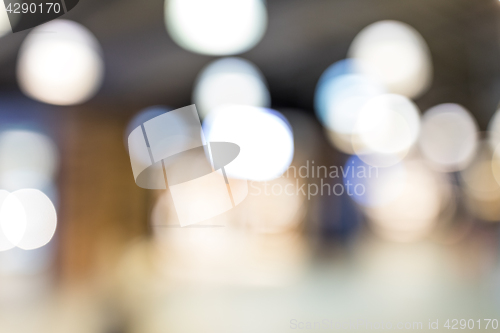 Image of Blur image of tourists walk in night market