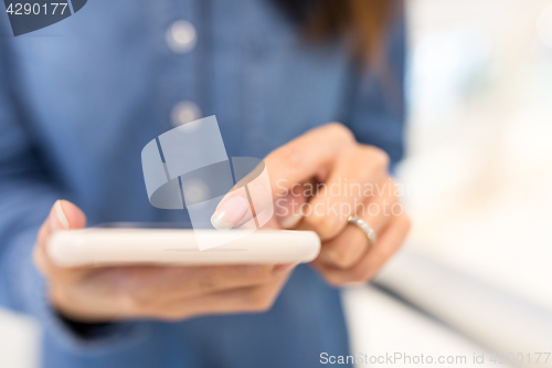 Image of Woman touch on cellphone