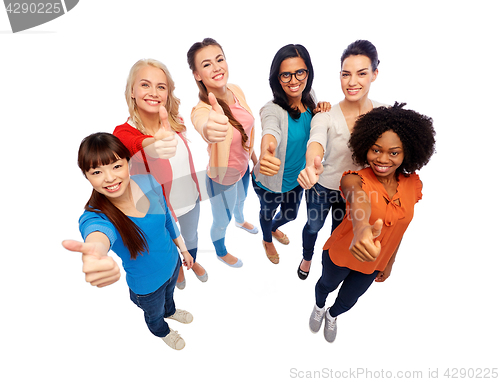 Image of international group of women showing thumbs up