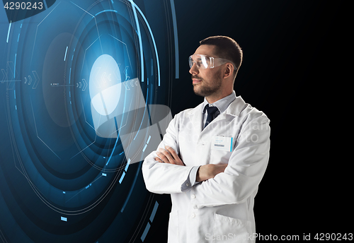 Image of scientist in lab goggles with virtual projection