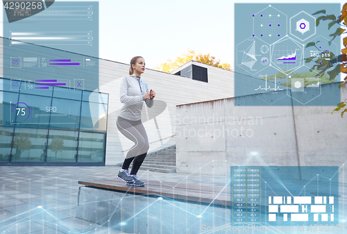 Image of woman exercising on bench outdoors