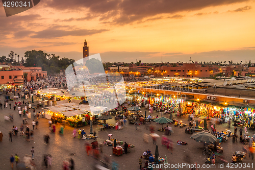 Image of Jamaa el Fna market square in sunset, Marrakesh, Morocco, north Africa.