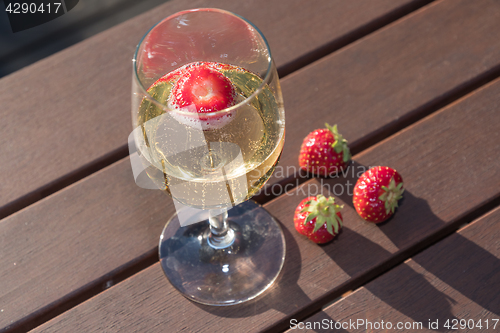 Image of Fresh strawberry in a glass sparkling wine