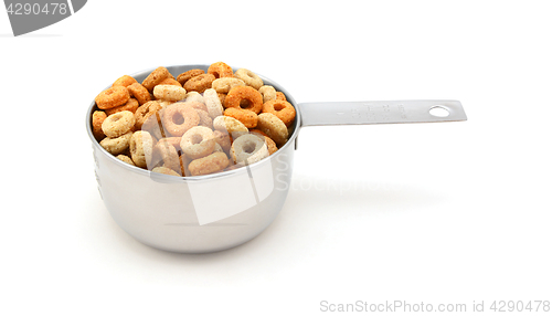 Image of Multigrain hoops breakfast cereal in a measuring cup