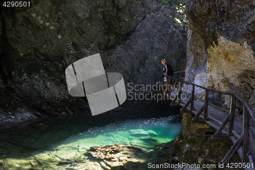 Image of Woman hiking in Vintgar gorge in Slovenia near lake Bled.