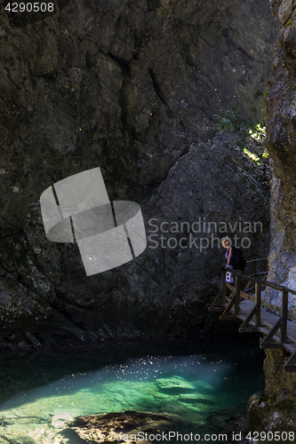 Image of Woman hiking in Vintgar gorge in Slovenia near lake Bled.