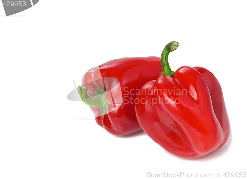 Image of Pair of Red Bell Peppers On White