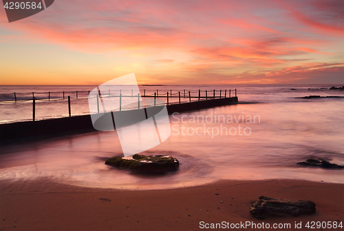 Image of Red dawn Newport Beach rock pool