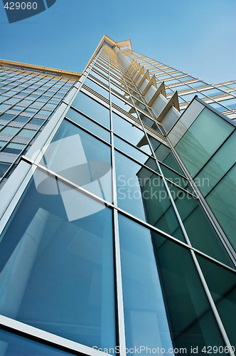 Image of Tall Blue Glass Skyscraper