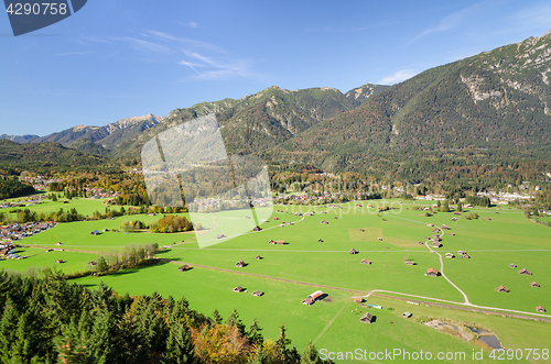 Image of Alpine aerial view of Bavarian valley with green pastureland