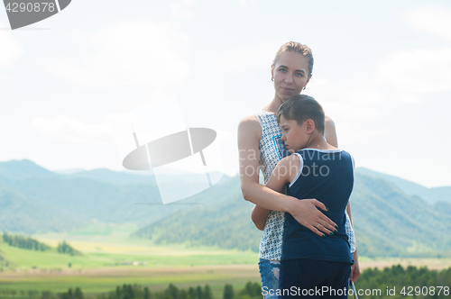 Image of selfie on mobile phone with stick