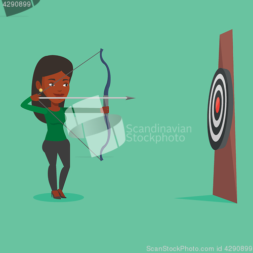 Image of Archer aiming with bow and arrow at the target.