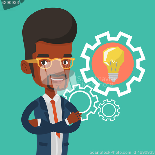 Image of Man with business idea bulb in gear.